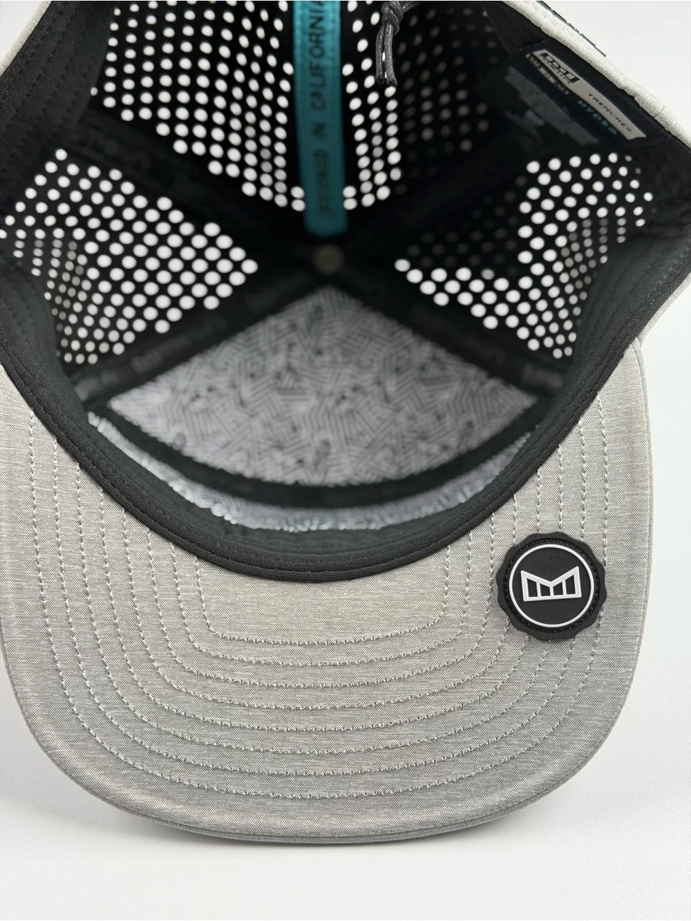 Melin Trenches Icon Hydro Performance Snapback Hat in Heather Grey, Classic